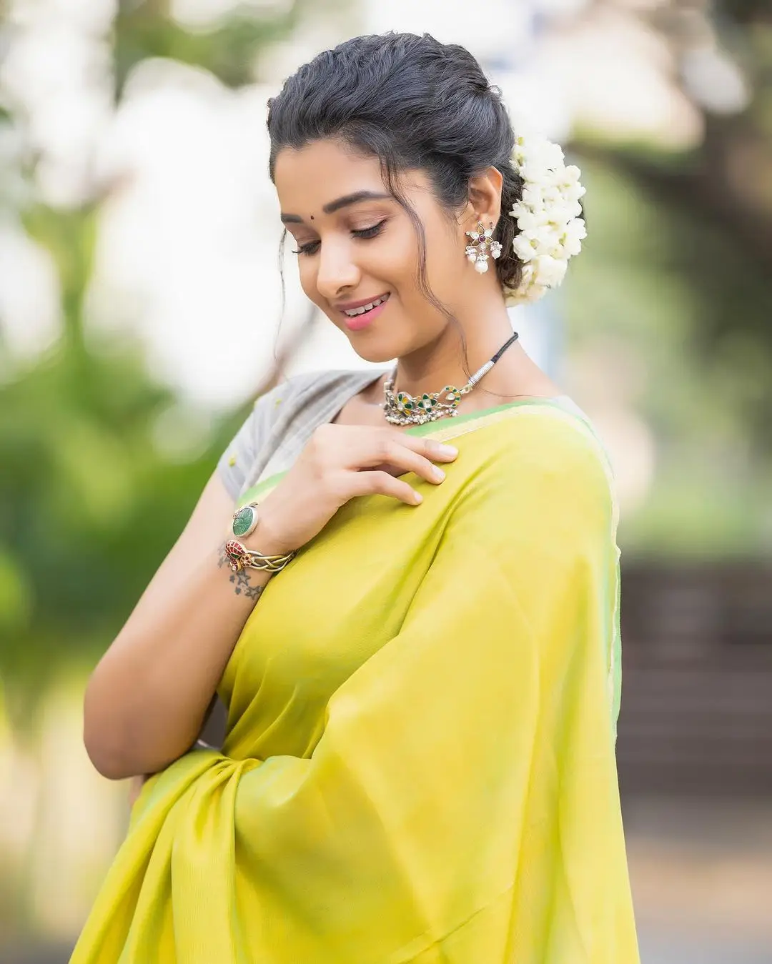 Priya Bhavani Shankar Wearing Beautiful Earrings Jewellery Green Saree